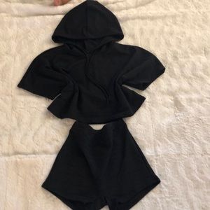 Two piece black short and crop shirt/jacket